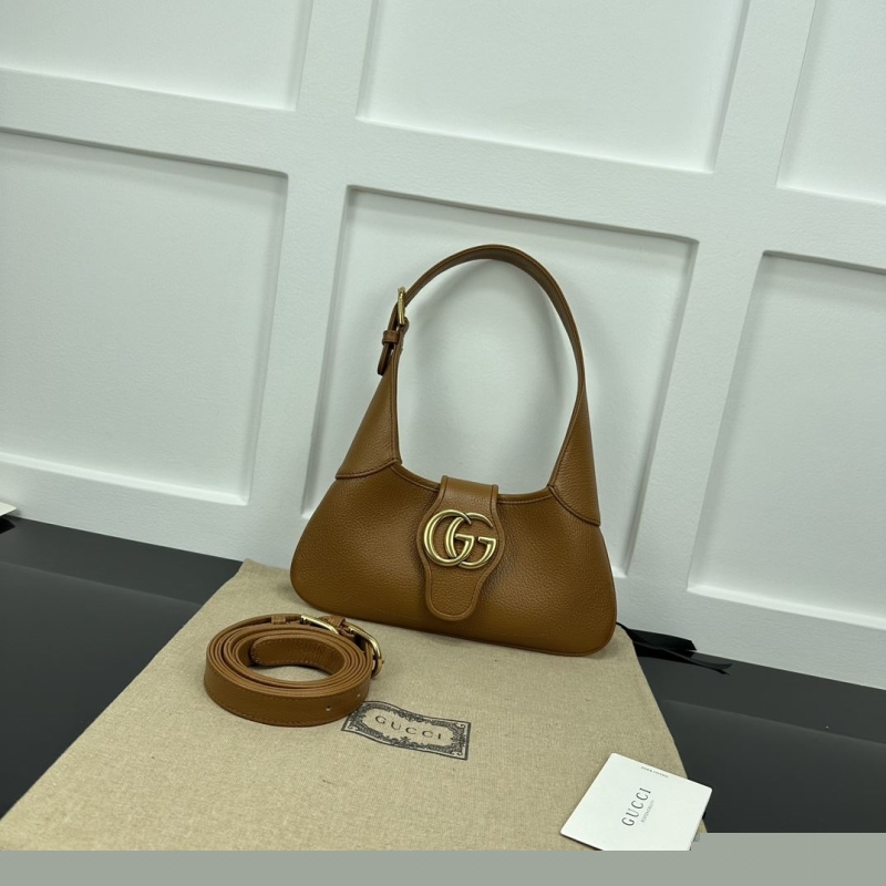 G*u*i top handle bags